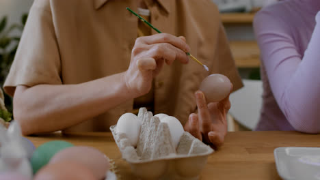 People-painting-Easter-ornaments