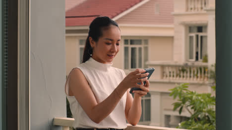 Asian-girl-using-smartphone