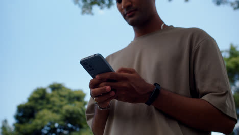 Man-using-smartphone-outdoors