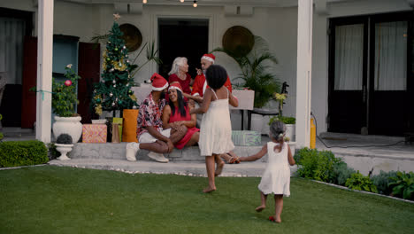 Happy-family-talking-outdoors