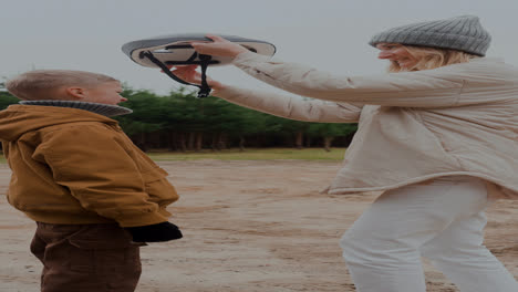 Mom-putting-bike-helmet-on-son