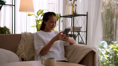 Asian-girl-using-smartphone