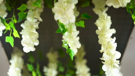 The-ceiling-is-adorned-with-a-stunning-arrangement-of-flowers