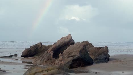 The-rugged-stones-and-rocky-formations-along-Zahara's-coastline-in-Spain-showcase-the-essence-of-natural-coastal-environments