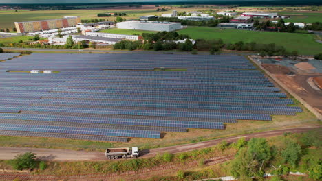 An-aerial-view-of-solar-panels-installation-bordering-a-town-in-German