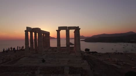 amazing-drone-footage-at-golden-hour-of-ancient-Temple-of-Poseidon,-Sounion
