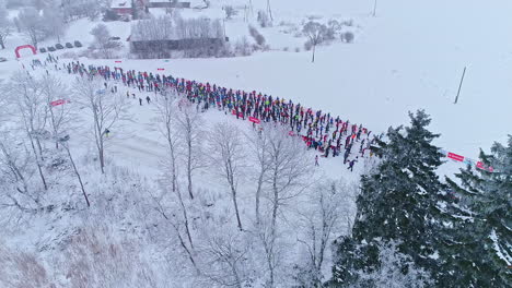 Start-group-of-ski-festival-"Apkārt-Alaukstam"-participants-in-aerial-view