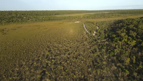 Aerial-clip-bushland-in-remote-outback-Australia,-late-afternoon
