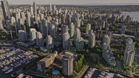 Vancouver-BC-Canada-Aerial-v42-birds-eye-view-drone-flyover-Coal-harbour-marina-capturing-waterfront-downtown-cityscape,-Eastside-shipyard-and-Burnaby-views---Shot-with-Mavic-3-Pro-Cine---July-2023