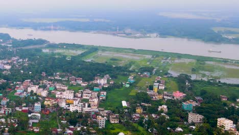Riverside-City-of-Barisal,-Kirtankhola-River,-Bangladesh,-Aerial-Panoramic