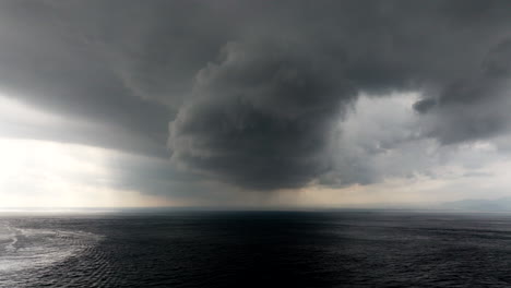 Dramatic-stormy-cumulus-clouds-over-dark-sea
