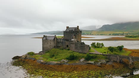 Aerial-View-of-Scottish-Castle-Eilean-Donan-on-Loch-Duich-in-the-Scottish-Highlands,-Scotland,-United-Kingdom