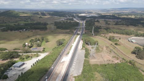 Aerial-view-of-cars-traffic-flowing-the-dual-carriageway-at-Mount-Annan
