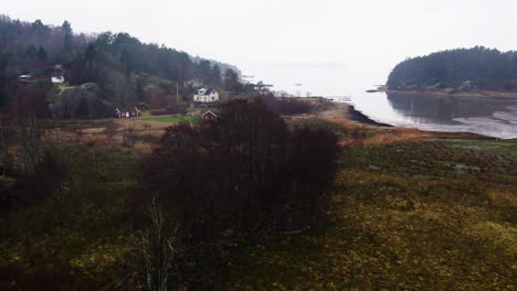 Drone's-Orbit-View-of-a-Swedish-Coastal-Countryside-Strait