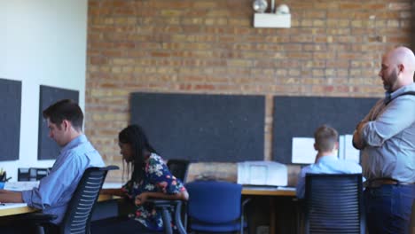 Employees-working-at-their-desks