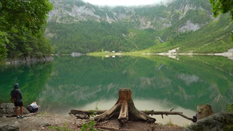 Couple-Taking-Pictures-near-The-Lake-in-Gosausee-Region