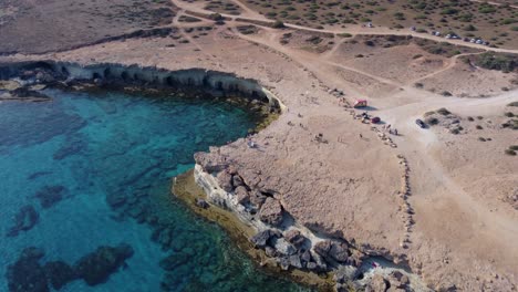 Orbit-View-over-Sea-Caves-Coastal-Front-of-Ayia-Napa,-Cyprus