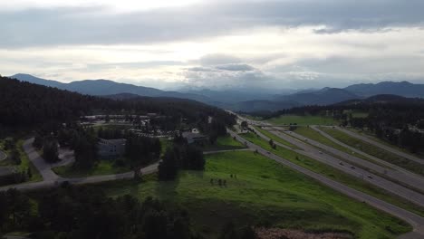 Drone-view-of-Colorado-mountains-and-highway