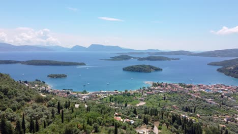 The-panoramic-view-from-the-Balcony-viewpoint-near-Nidri-village-showcases-Lefkada-island-and-the-neighboring-Ionian-beaches,-frequented-by-those-exploring-the-Ionian-islands