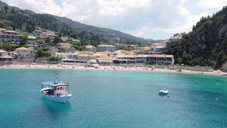 Coastal-Village-Agios-Nikitas-at-Lefkada-Island,-Greece---Scenic-Aerial