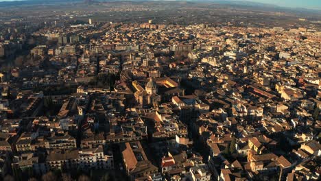 Aerial-Drone-over-Granada-With-Cathedral-Iglesia-de-Santo-Domingo,-Andalusia,-Spain