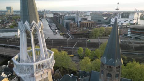 Aerial-Pullback-Reveals-Posthoornkerk-Church-in-Jordaan,-Amsterdam,-Netherlands