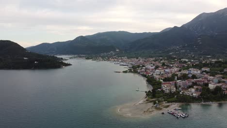 Aerial-drone-video-of-beautiful-seaside-town-and-bay-of-Nidri,-Lefkada-island,-Ionian,-Greece