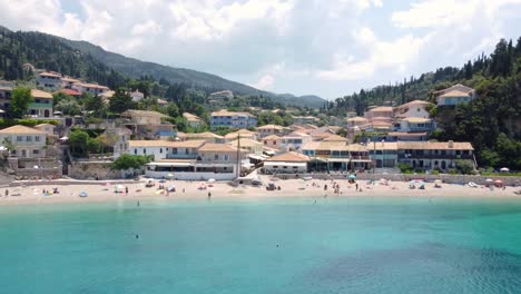 Cute-Agios-Nikitas-village-with-turquoise-water-lagoon,-Lefkada,-Ionian-Islands,-Greece