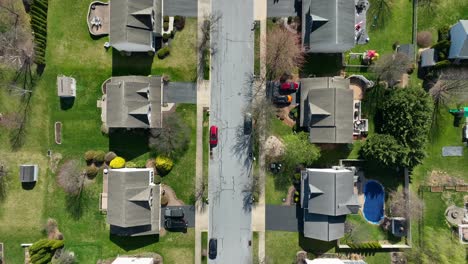 Quaint-american-neighborhood-with-homes-and-swimming-pool-in-garden