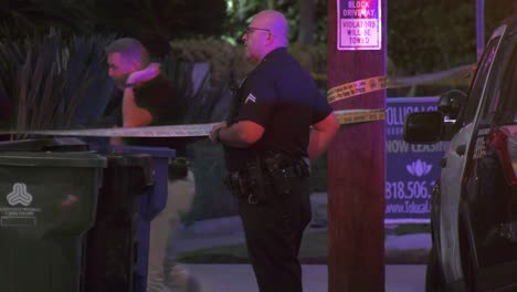 Police-Officer-setting-up-crime-scene