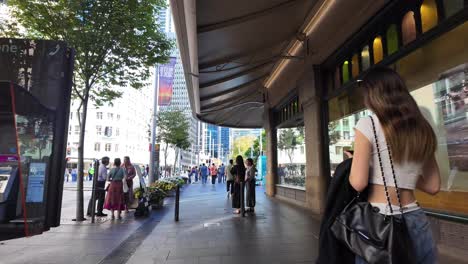 Slow-motion-of-asian-woman-and-pedestrians-walking-at-Queen-Victoria-Building-QVB-in-Sydney-CBD