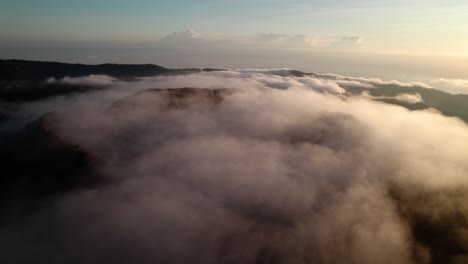 Cloudscape-Canopy-Over-The-Mountains-Of-Batur-During-Sunrise-In-Bali-Island,-Indonesia