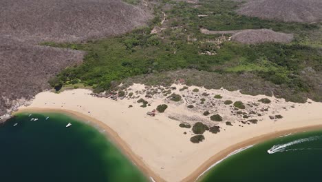 Drone-captured-overviews-of-Cacaluta-Bay,-Huatulco,-Oaxaca