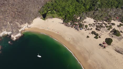 Coastline-bordering-Cacaluta-Bay,-part-of-Huatulco's-array-of-nine-bays,-Oaxaca,-Mexico