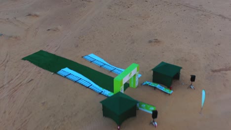 Aerial-view-over-people-at-the-Ecotrail-event,-evening-in-Al-Ula,-Saudi-Arabia