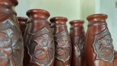 Beautiful-clay-vases-made-in-pottery,-close-up-view