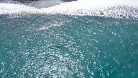 Ocean-waves-of-a-tropical-country_drone-forward-shot