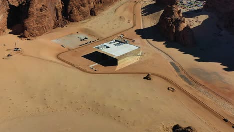 Aerial-view-towards-the-Maraya-concert-hall,-in-Saudi-Arabia---approaching,-drone-shot