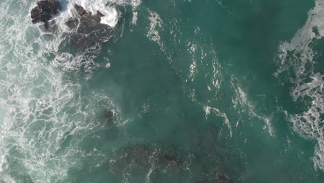 4K-dramatic-overhead-pull-up-of-rough-seas-in-Monterey-Bay-California