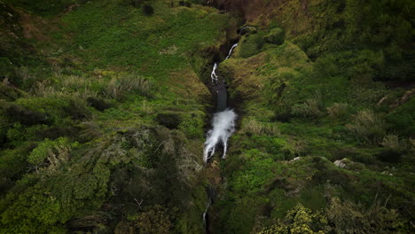 Rocha-do-Navio-from-above,-waterfall-topshot,-mountain-view-to-sea-waves,-Madeira,-Portugal