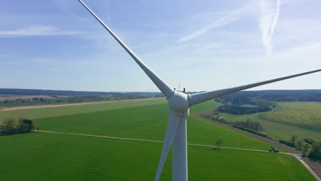 Wind-turbine-close-up-aerial-shot---Windmill-in-a-scenic-panorama