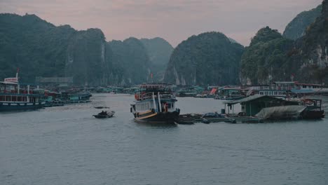 Profile-view-of-local-boats-parked-in-Lan-Ha-Bay-in-Vietnam-during-evening