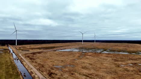Cloudy-Sky-Over-Wind-Farm-In-Kurzeme,-Riga,-Latvia