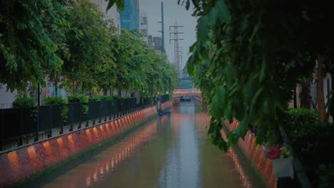 Slow-cinematic-shot-of-Khlong-Ong-Ang-canal-of-Bangkok