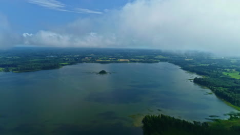 Panorama-Of-Green-Swampy-Lake-With-Cloudscape-Sky