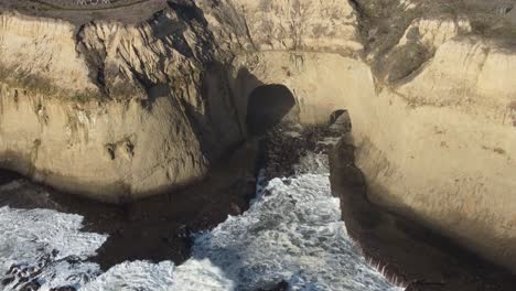 Drone-Footage-of-a-Cave-near-Martin's-Beach,-California