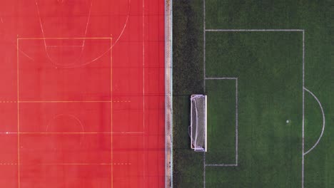 Recreational-green-grass-active-sports-football-and-orange-basketball-fields-overhead-top-down-view