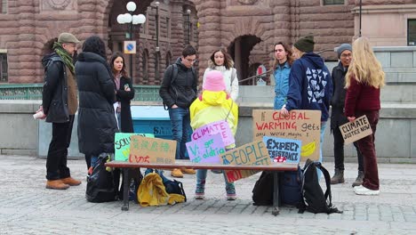 Fridays-for-Future-activists-at-climate-strike-with-signs-in-Stockholm-by-Swedish-Parliament