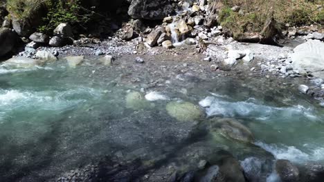 4K-Aerial-Drone-Flight-along-crystal-clear-mountain-river-and-stream-in-Austria,-Europe