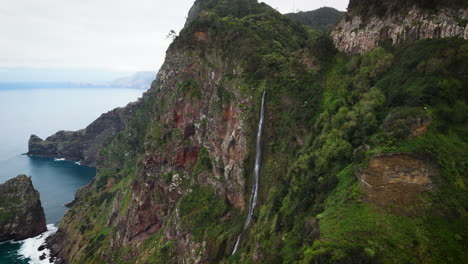 Madeira-landscape-view,-drone-view-of-seashore,-high-mountain-waterfall,-Madeira-Island,-Portugal
